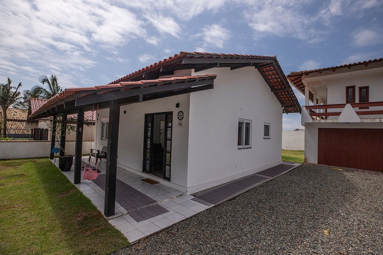 Casa família com brinquedoteca - pé na areia