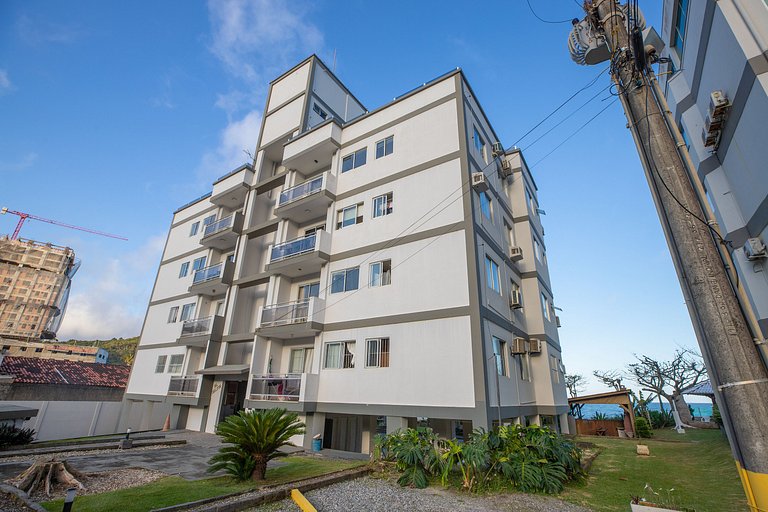 Pé na areia em Balneário Camburiu