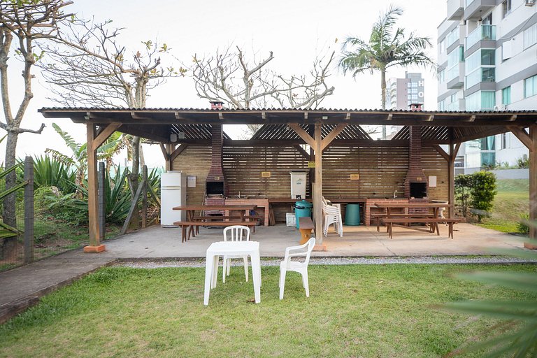 Pé na areia em Balneário Camburiu